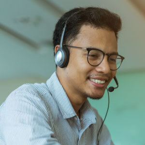 Man working at a call center.